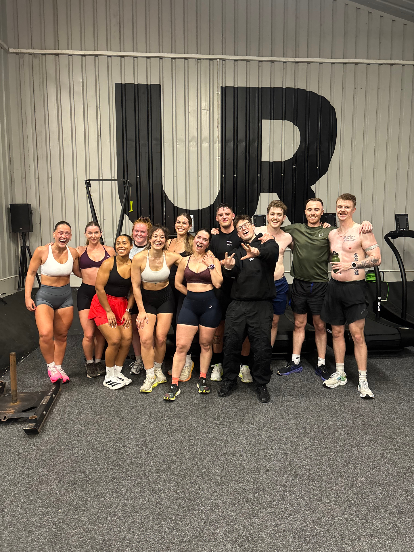 L-Evate members together after a group training session